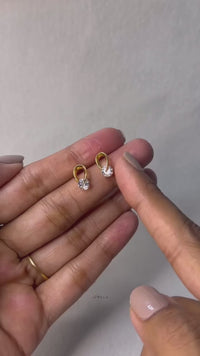 Rotating Volute Earrings — A Curve Around the Light